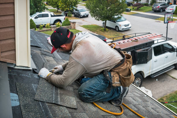 Professional Roofing technician working in Armington, IL